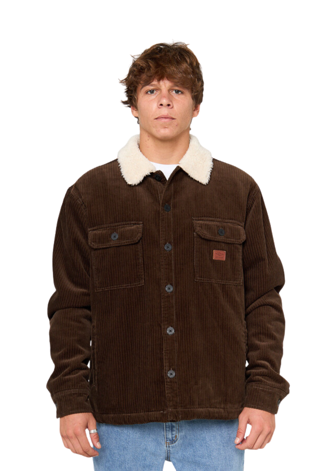 Man wearing a brown corduroy jacket with white fur collar on a white background