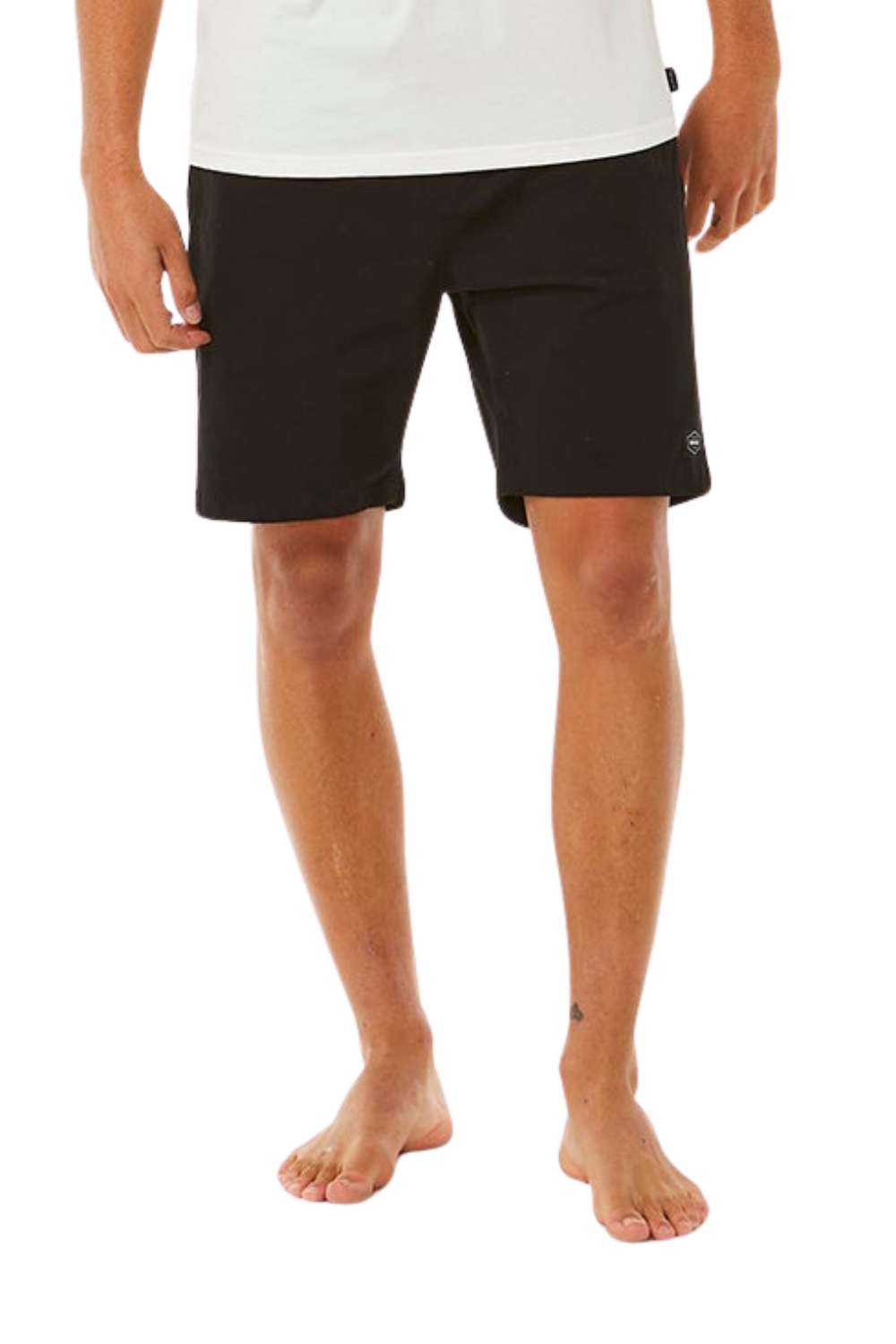 Person wearing black shorts and a white shirt on a white background