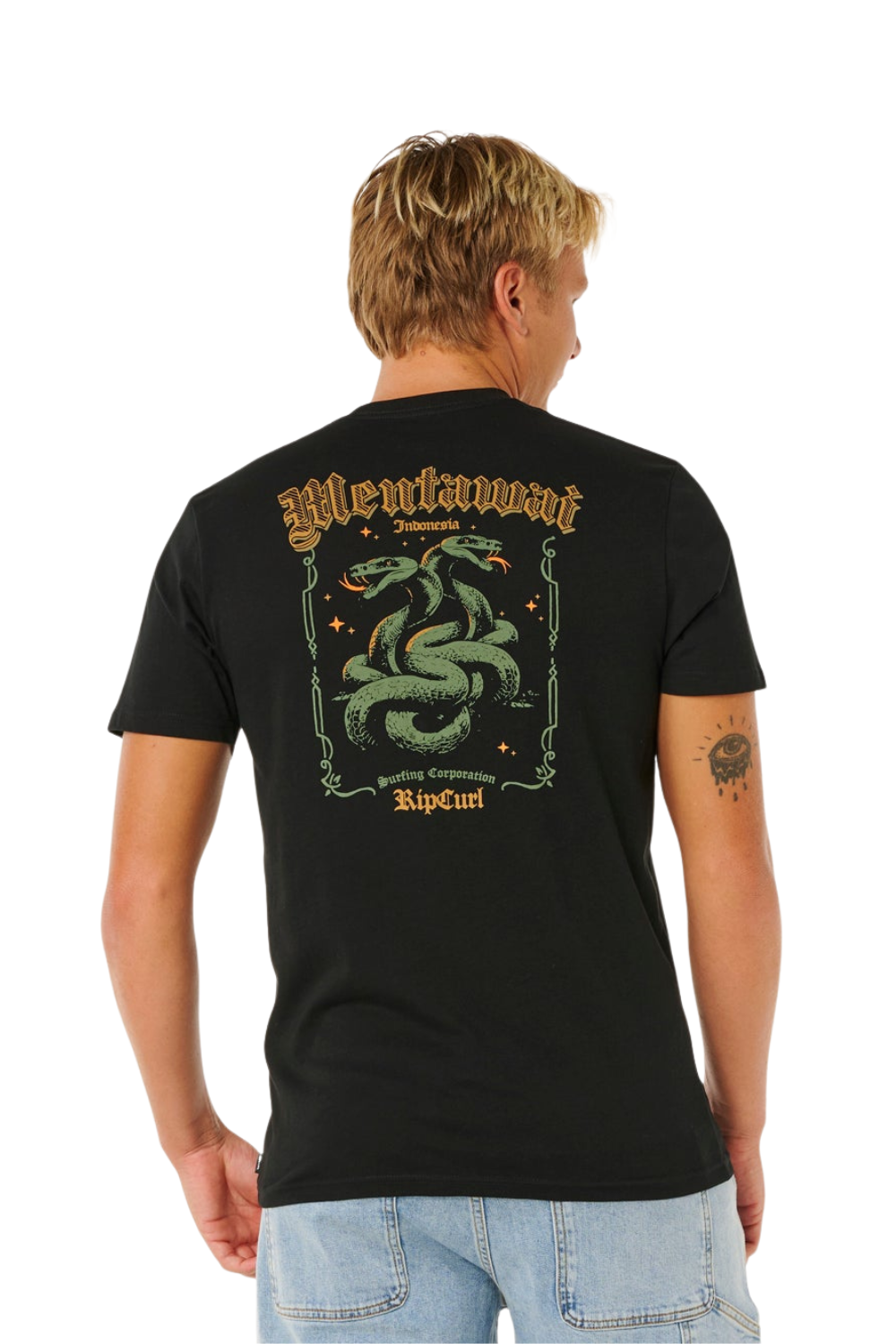 Person wearing a black t-shirt with a bold print on the back