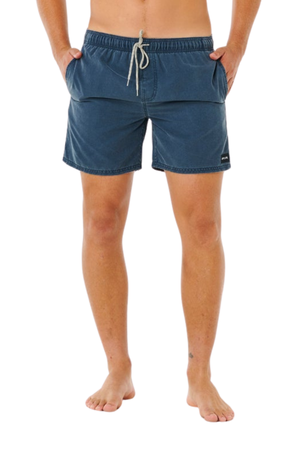 Person wearing blue swim shorts on a white background