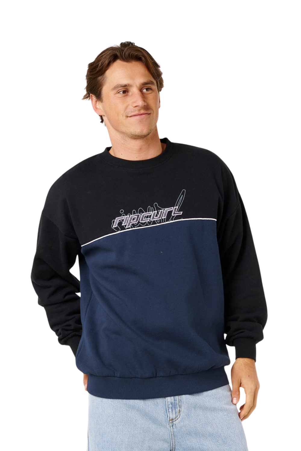Man wearing a back and navy Rip Curl sweatshirt on a white background