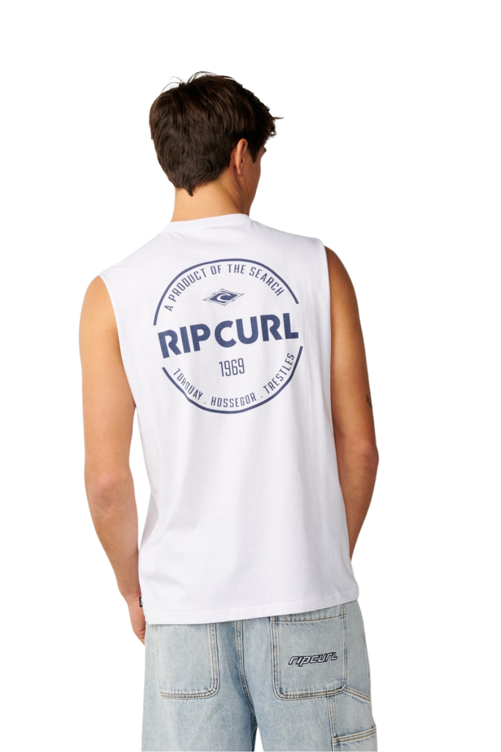 Person wearing a Rip Curl Mens Muscle Vest in White with a graphic logo Rip Curl print on the back