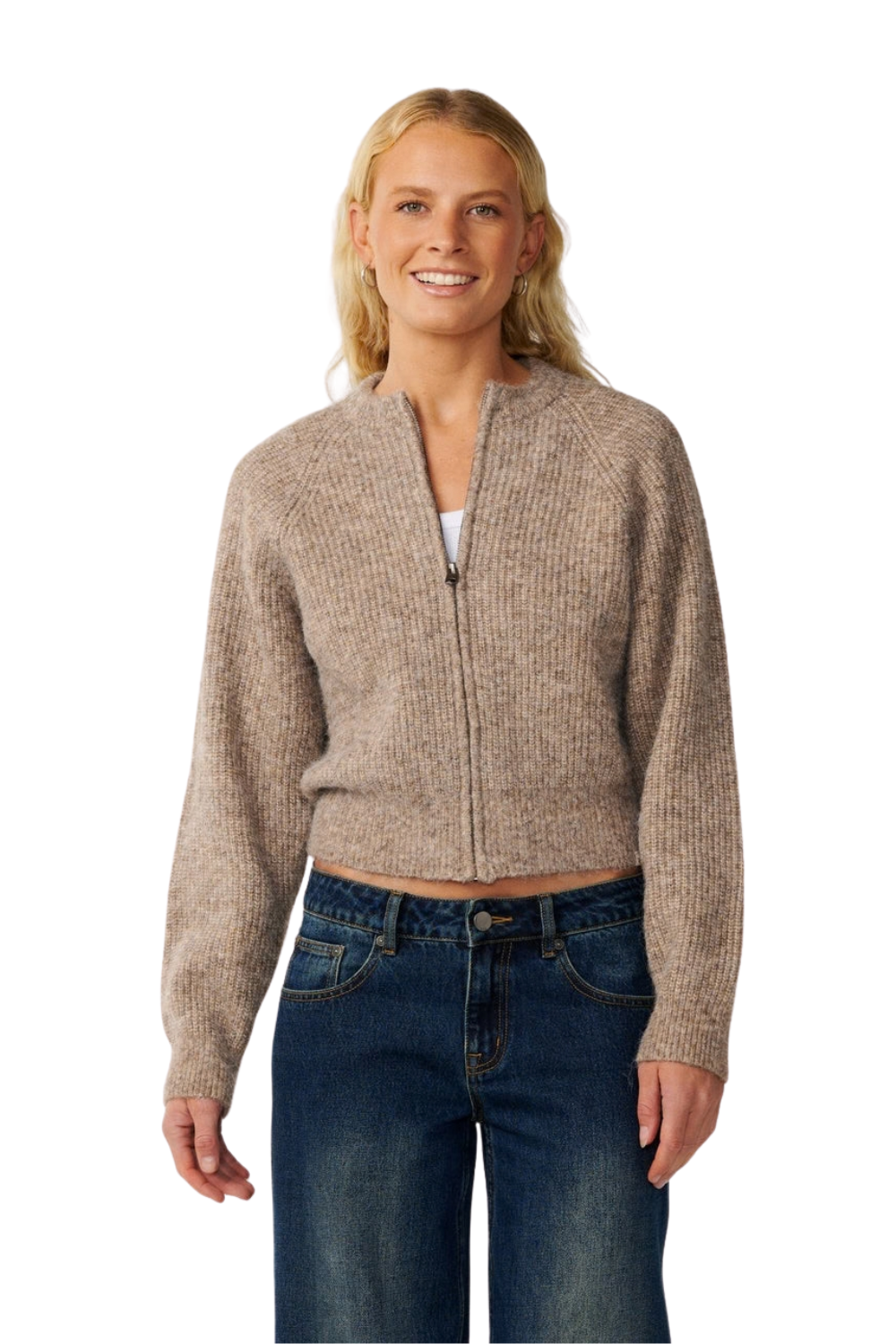 A woman modeling a cropped, ribbed knit zip-up cardigan in a heathered taupe-brown color, paired with dark blue jeans, against a plain white background.