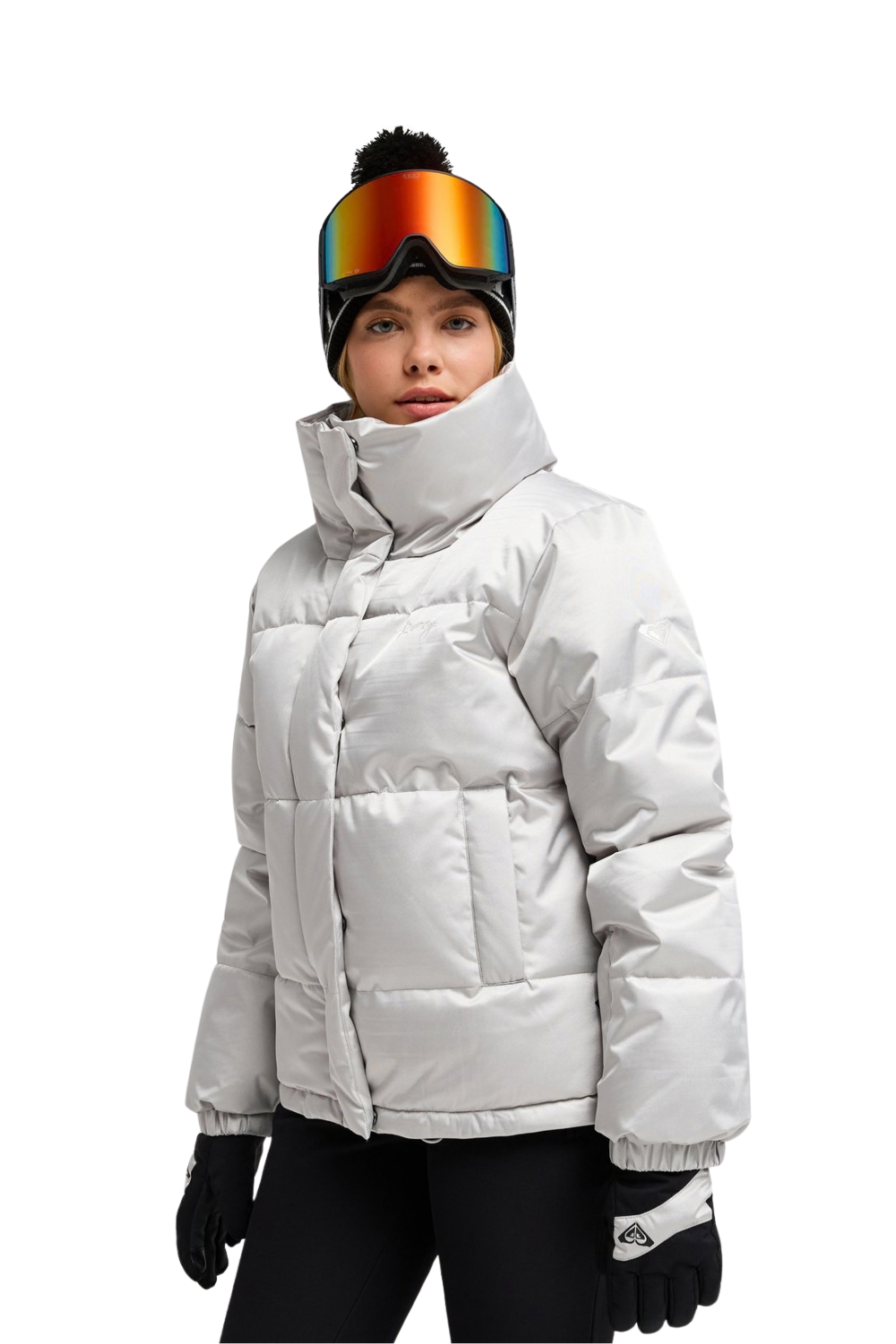 A model wearing a light gray puffer jacket, black ski pants, black gloves, and a black beanie with rainbow-tinted ski goggles, photographed against a solid white background.