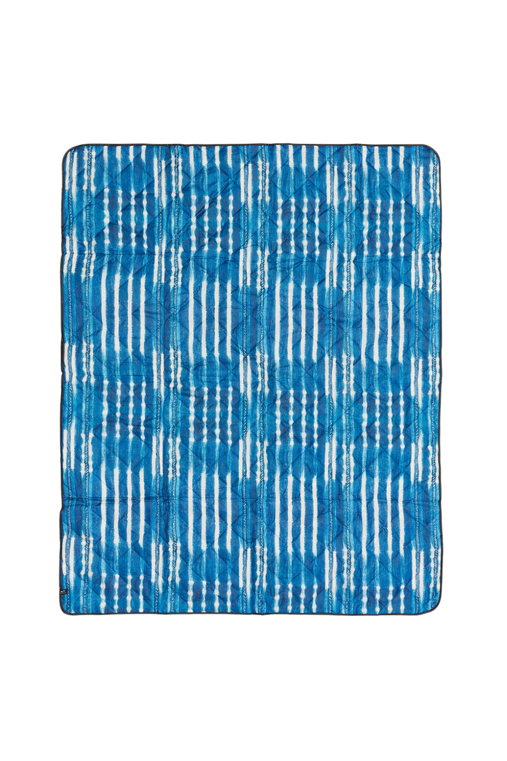 Blue patterned beach mat with white lines on a white background