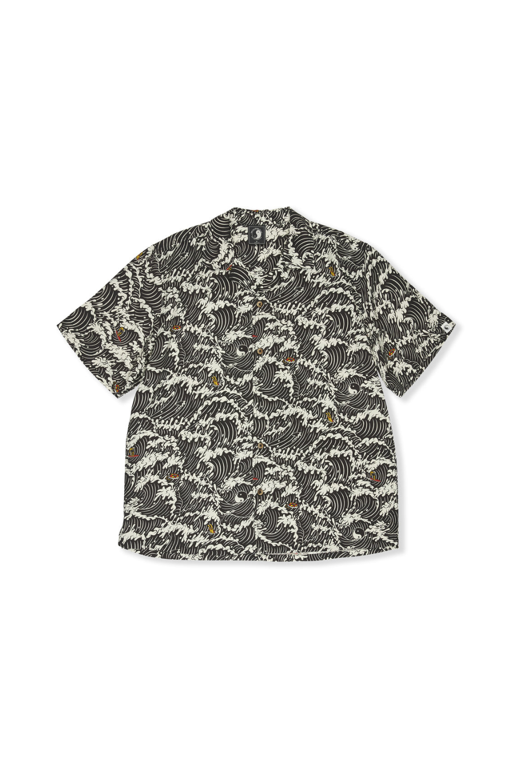 Black and white wave patterned short sleeve shirt on a white background