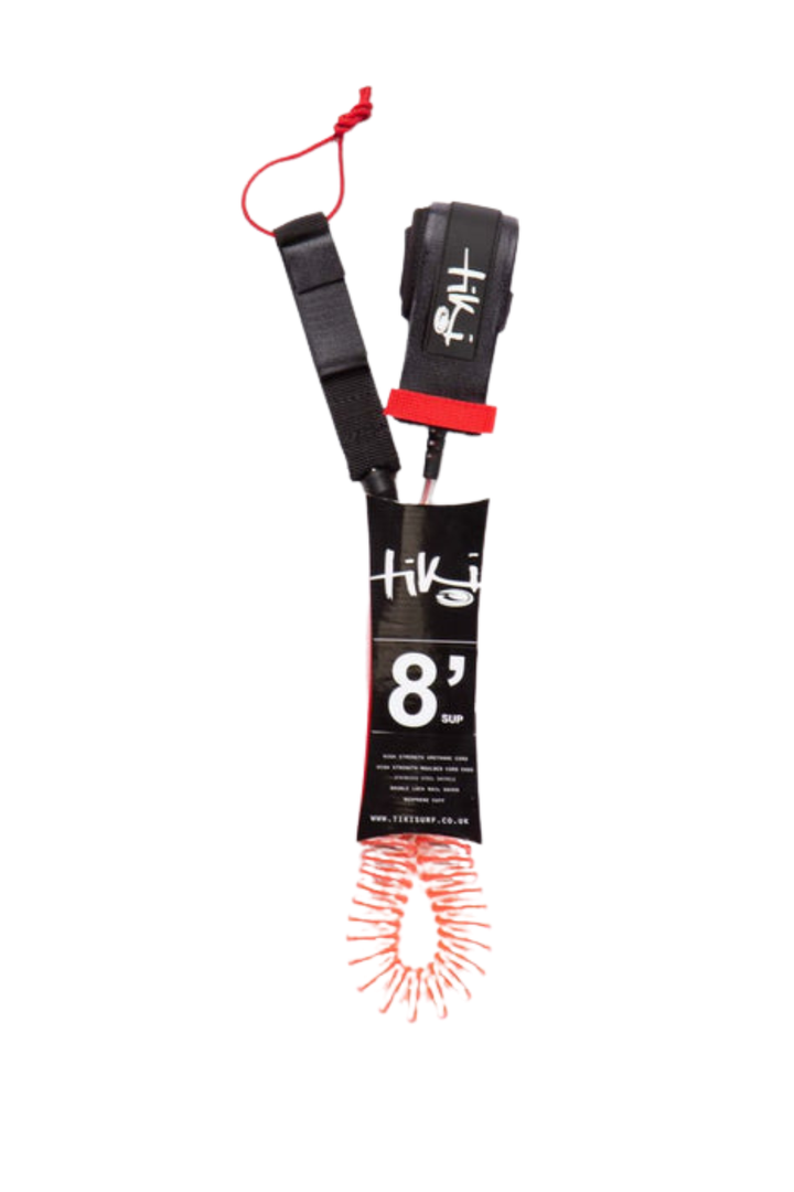 Tiki SUP surf leash with an red coiled spring and a black and red strap, shown on a plain white background. The leash features white and black branding text.
