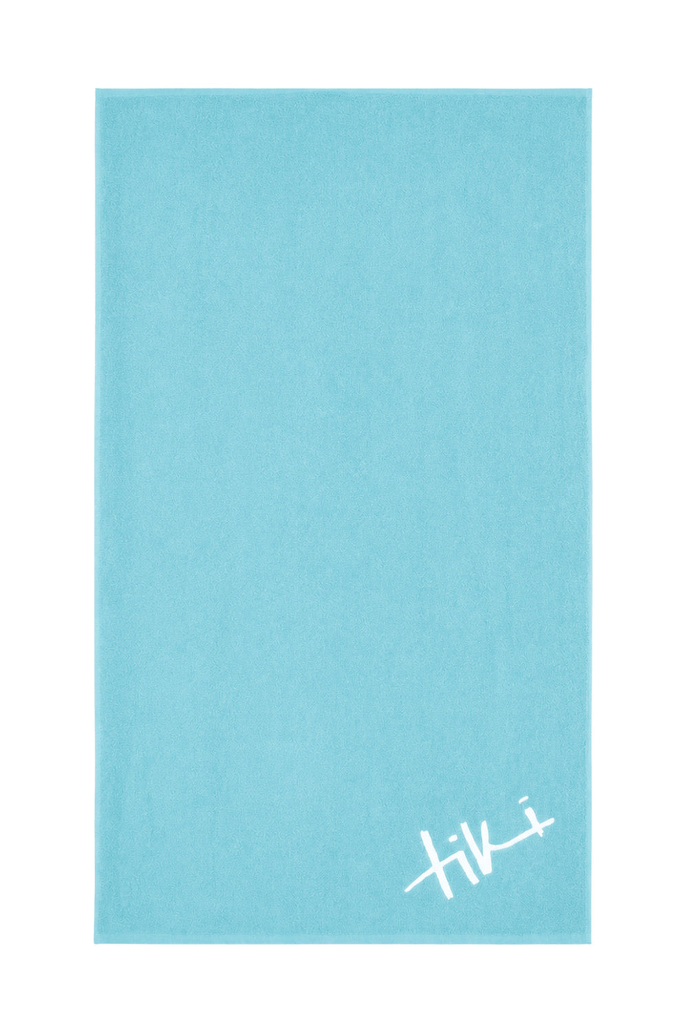 A light blue rectangular towel with a white stylized 'Tiki' logo in the bottom right corner, displayed flat against a white background.