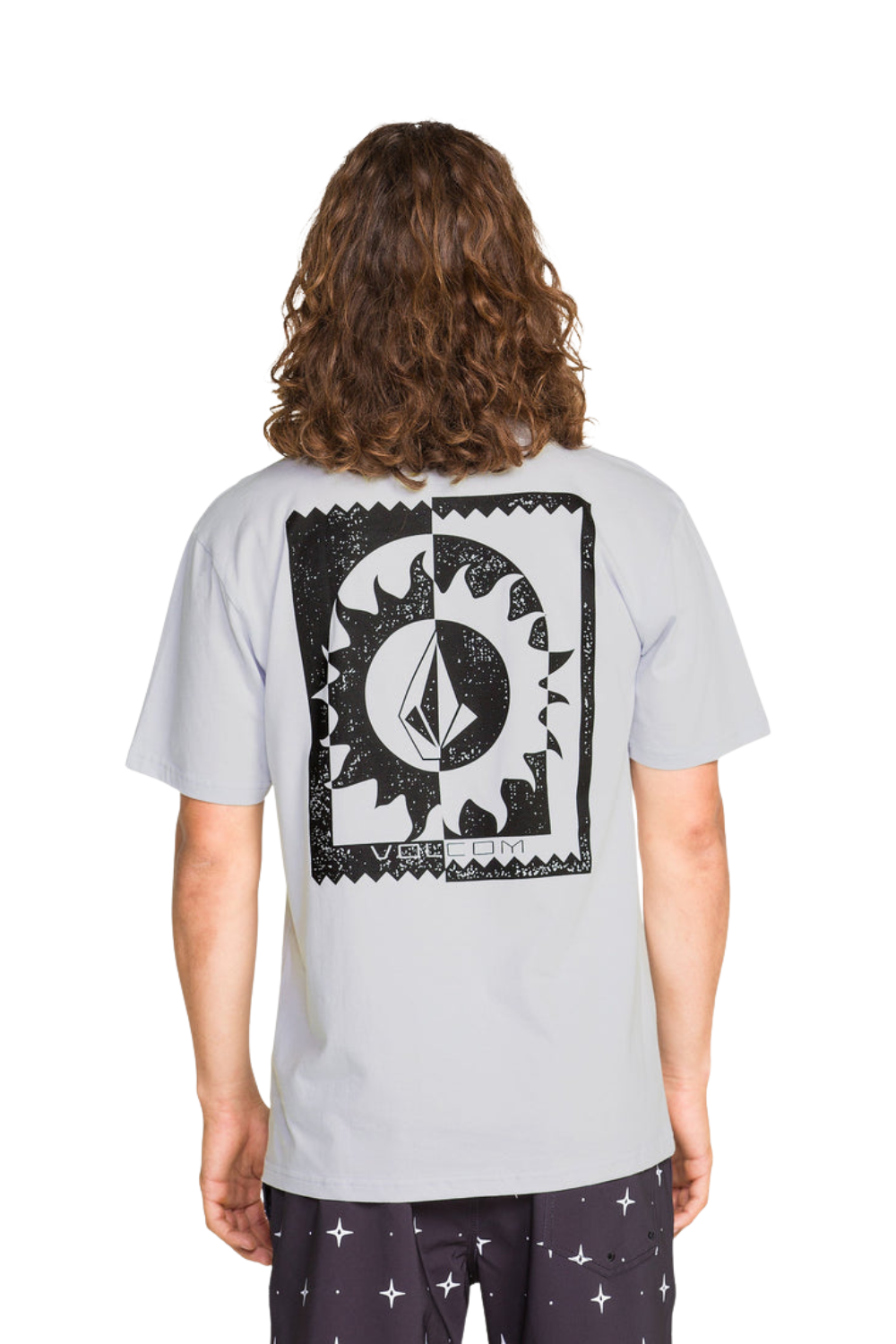 Person wearing a light gray t-shirt with a black graphic on the back, standing against a white background.