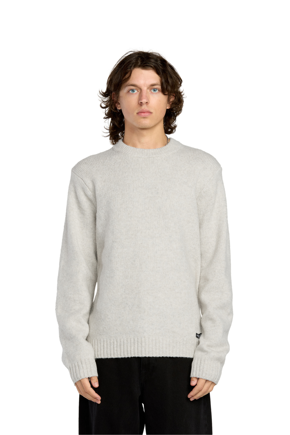 Man wearing a light gray sweater on a white background