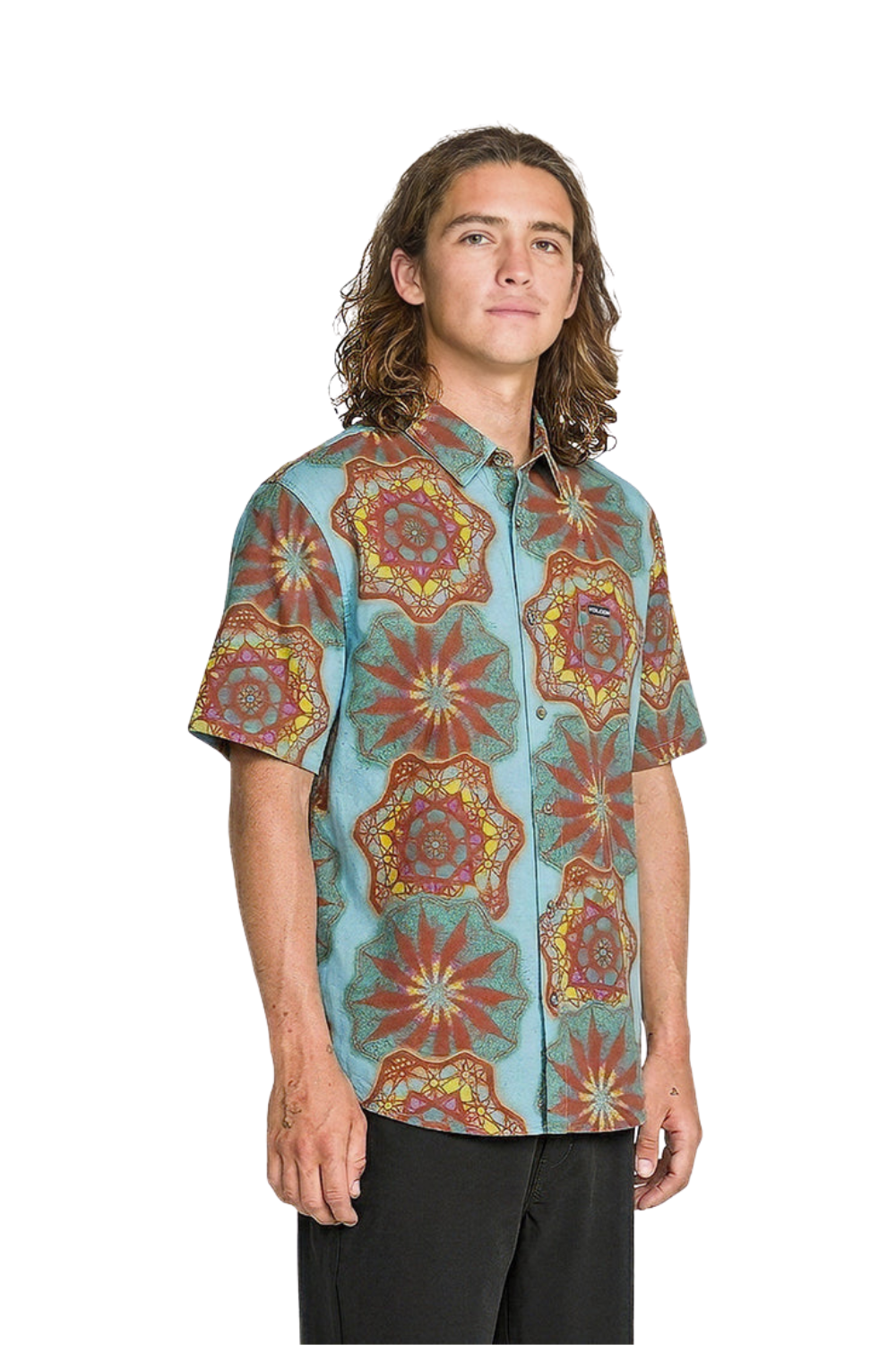 Man wearing a multicoloured Volcom short sleeved shirt  