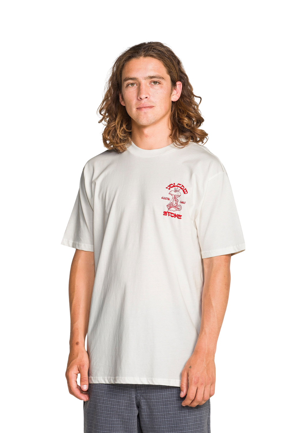 Person wearing a white t-shirt with a red graphic on a white background