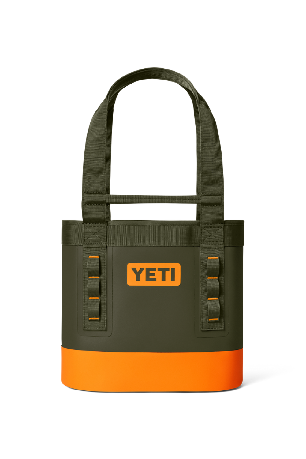 A YETI tote bag in dark olive green with a bright orange bottom band and orange accents, including the YETI logo patch on the front, set against a plain white background.