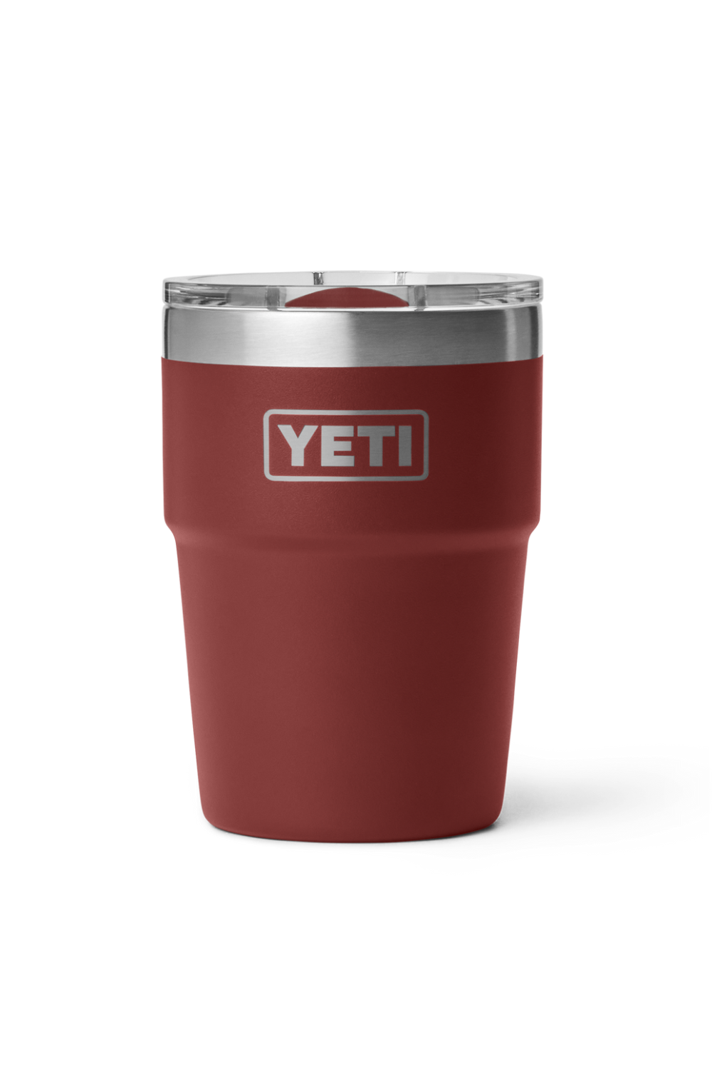 A YETI insulated travel tumbler in matte red with a stainless steel rim and a clear lid, shown on a clean white background.