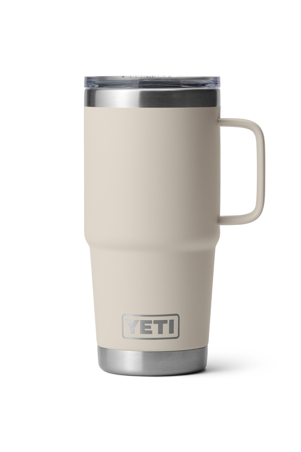 A YETI 20 oz travel mug in a matte beige colour with stainless steel accents at the lid and base, featuring a matching cream handle.