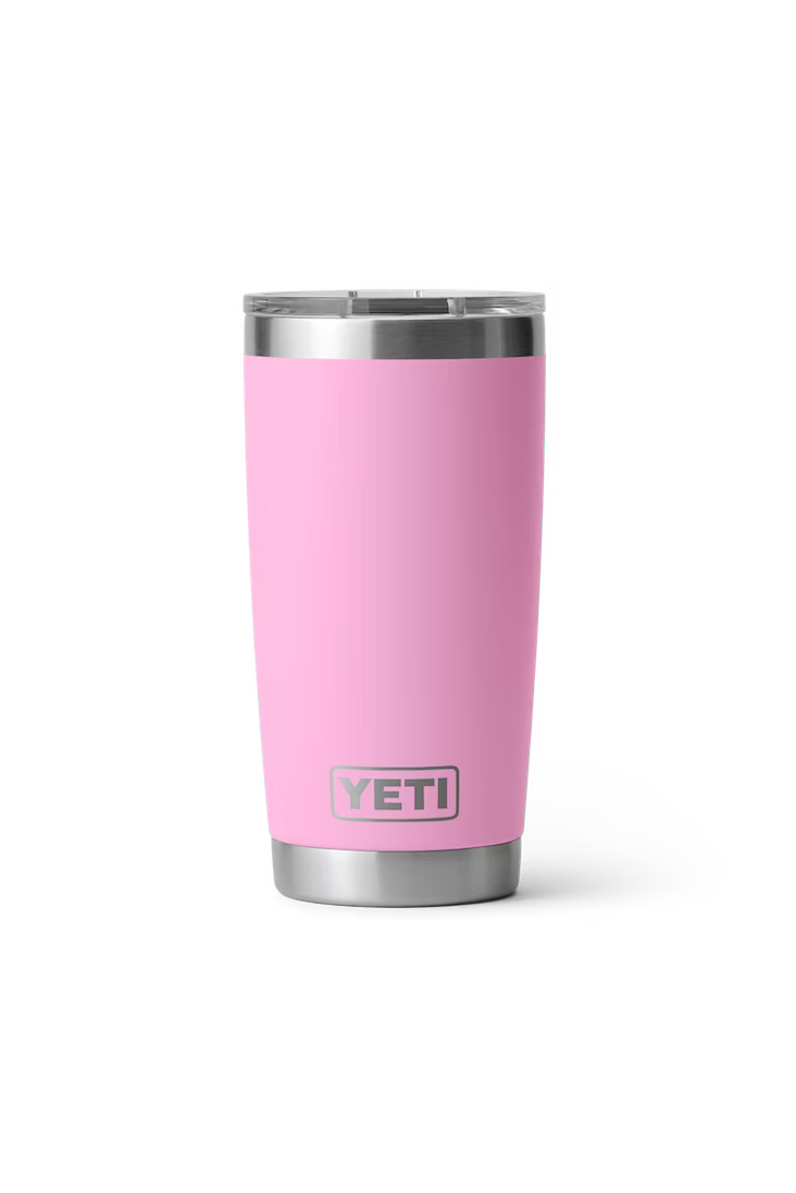 A pink Yeti Rambler 20oz tumbler with a metallic rim and a magnet slider lid.