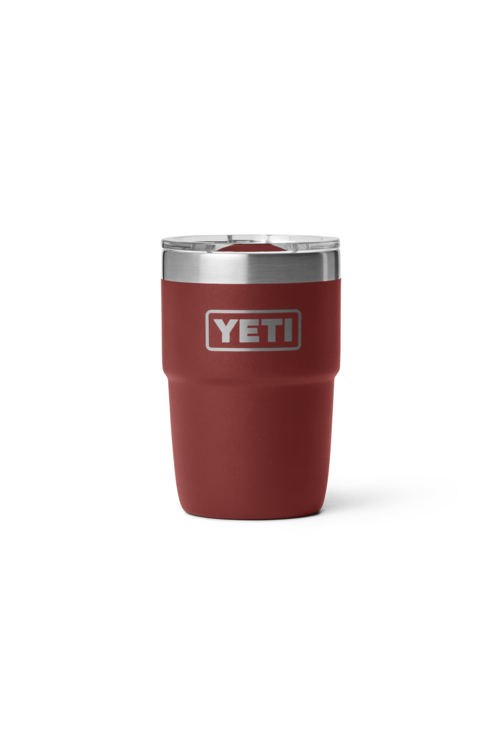 A YETI insulated cup in a matte brick red colour, featuring a silver stainless steel rim and a silver YETI logo on the front, set against a plain white background