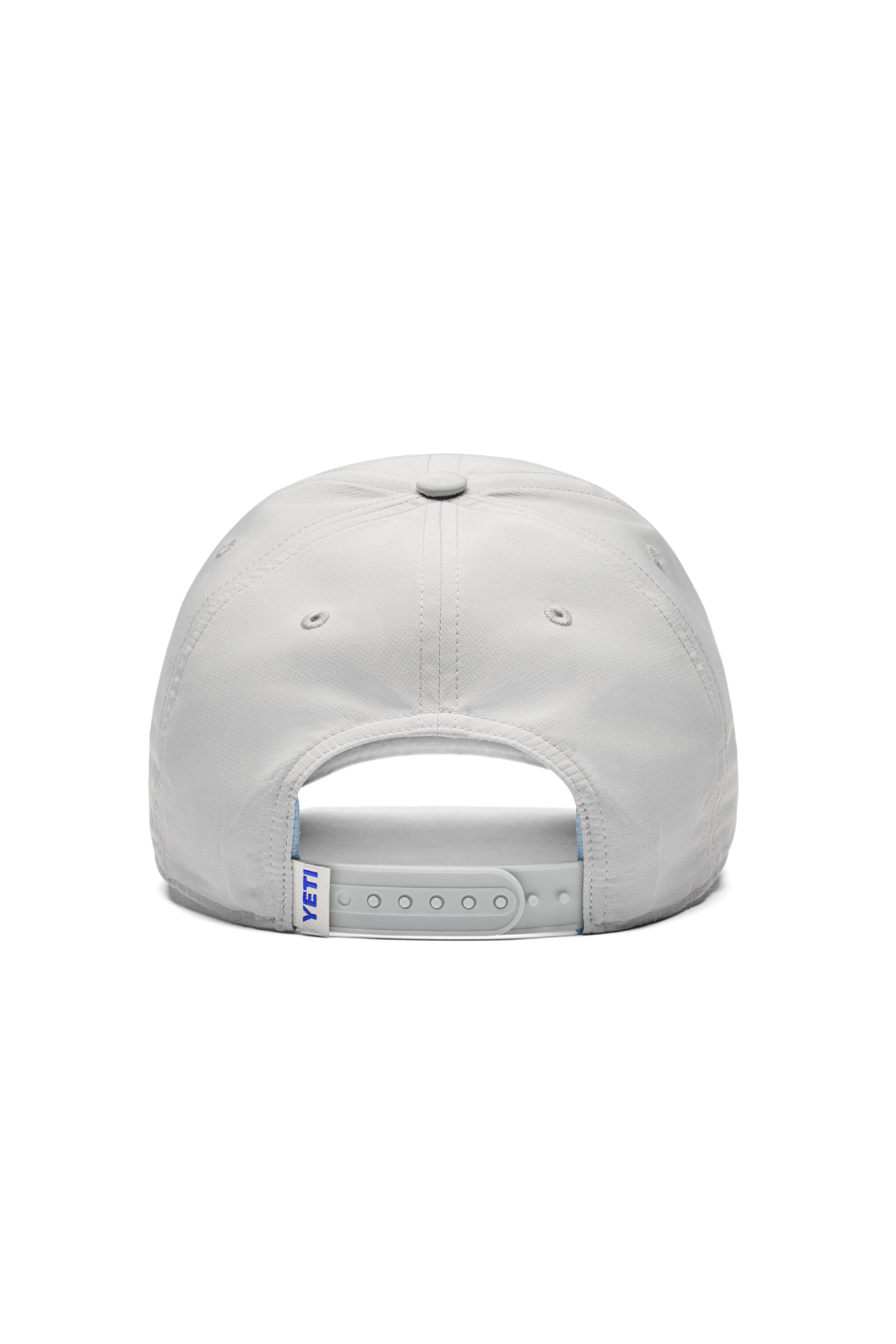 The back view of a light gray snapback cap on a solid white background, showing the adjustable strap and a small blue and white 'YETI' tag.